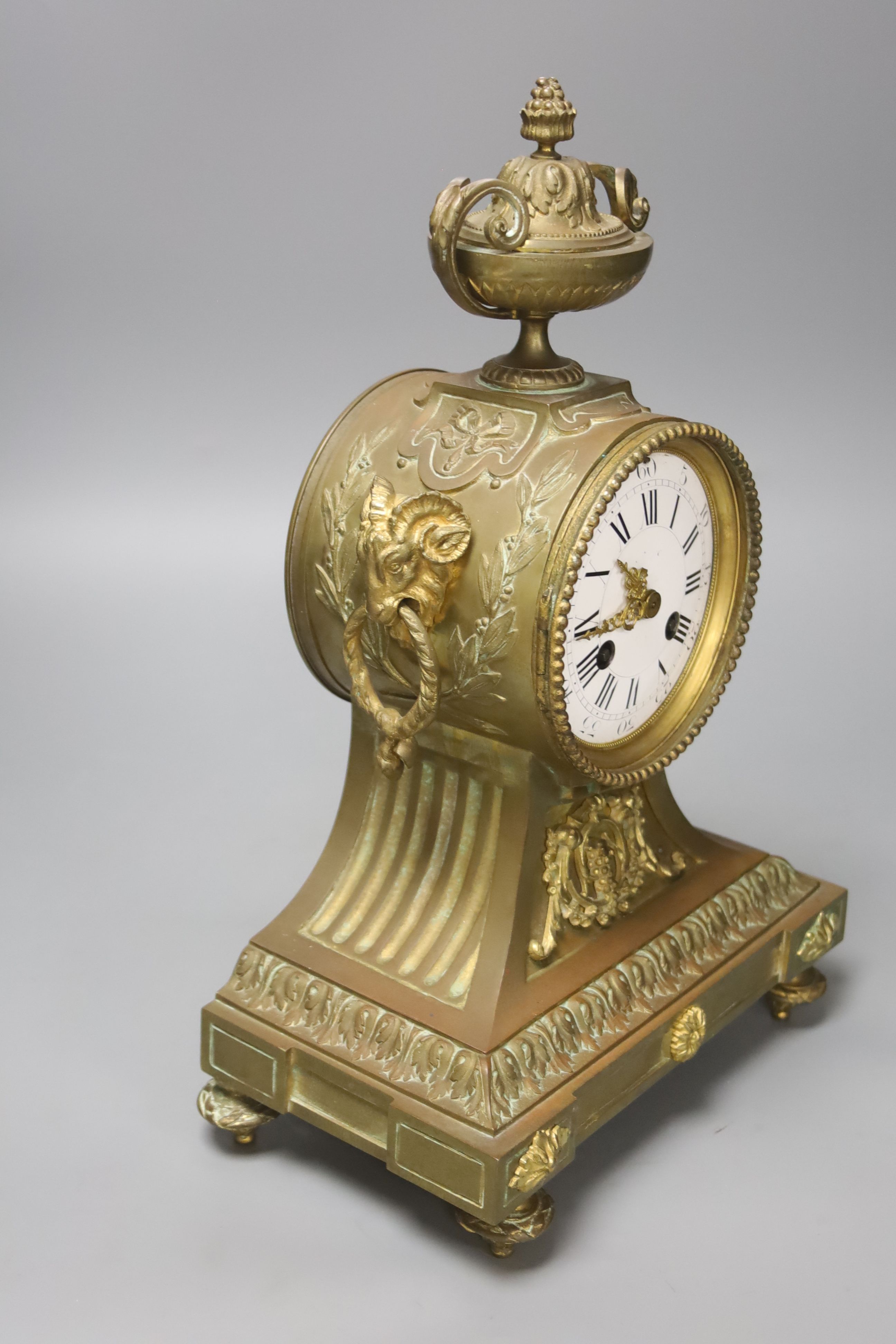 A Louis XVI style bronze mantel clock, height 38cm